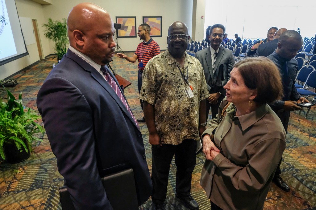 Rankins greets a faculty member, who had asked about IHL’s role as a governing body. (Photo by Charles A. Smith/JSU)
