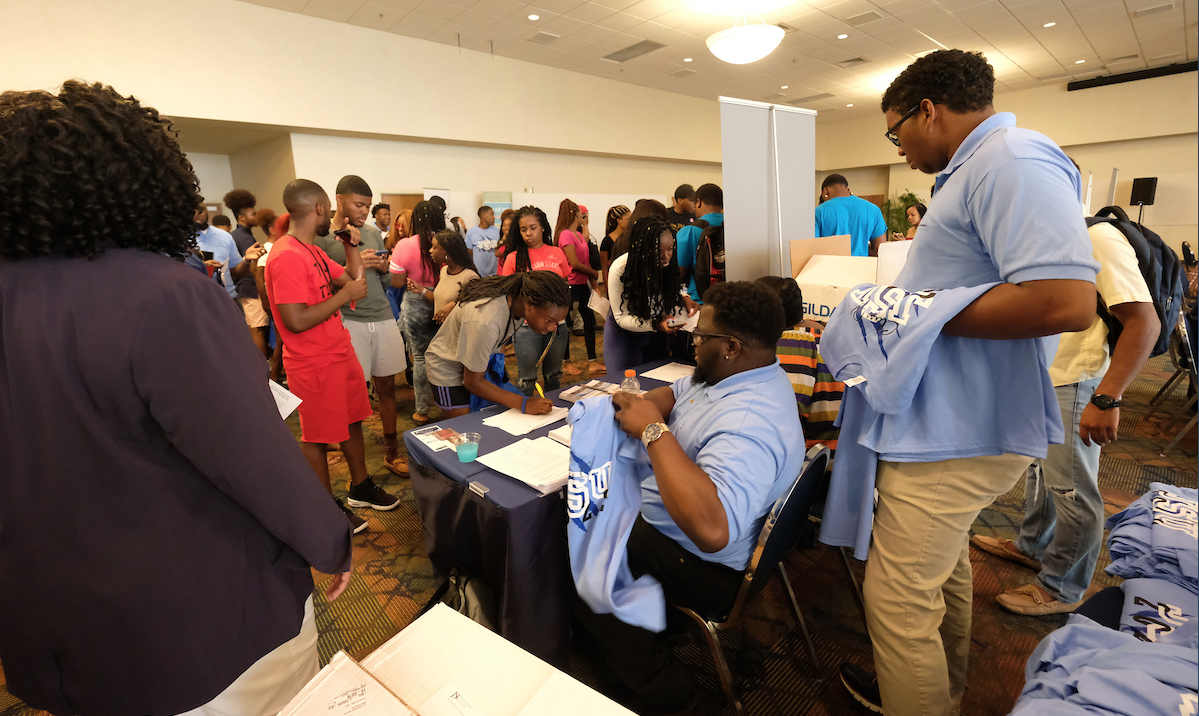 The Division of Student Affairs, along with student supporters, presents information about its many services and shirts to members of the Class of 2022. (Photo by Charles A. Smith/JSU)Facilities and Construction Management provides a host of services. Among these include shuttle service throughout the main campus and to the Mississippi eCenter@JSU, Jackson Medical Mall and Metro Center. (Photo by Charles A. Smith/JSU)