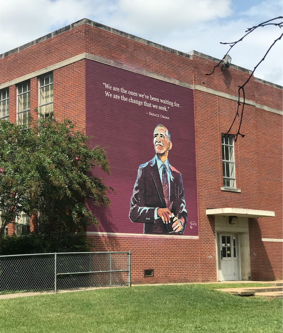 Jackson State University alums Charles and Talameika Brice are responsible for the large and vibrant mural of Obama that can be found on the wall of the elementary school that bears his namesake. (Photo special to JSU)