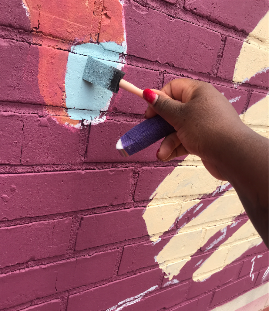 An unfortunate mishap resulted in Talameika breaking her finger. However, the artist persisted and together, she and her husband, were able to still complete the mural in time for the Aug. 17 unveiling ceremony. (Photo special to JSU.)