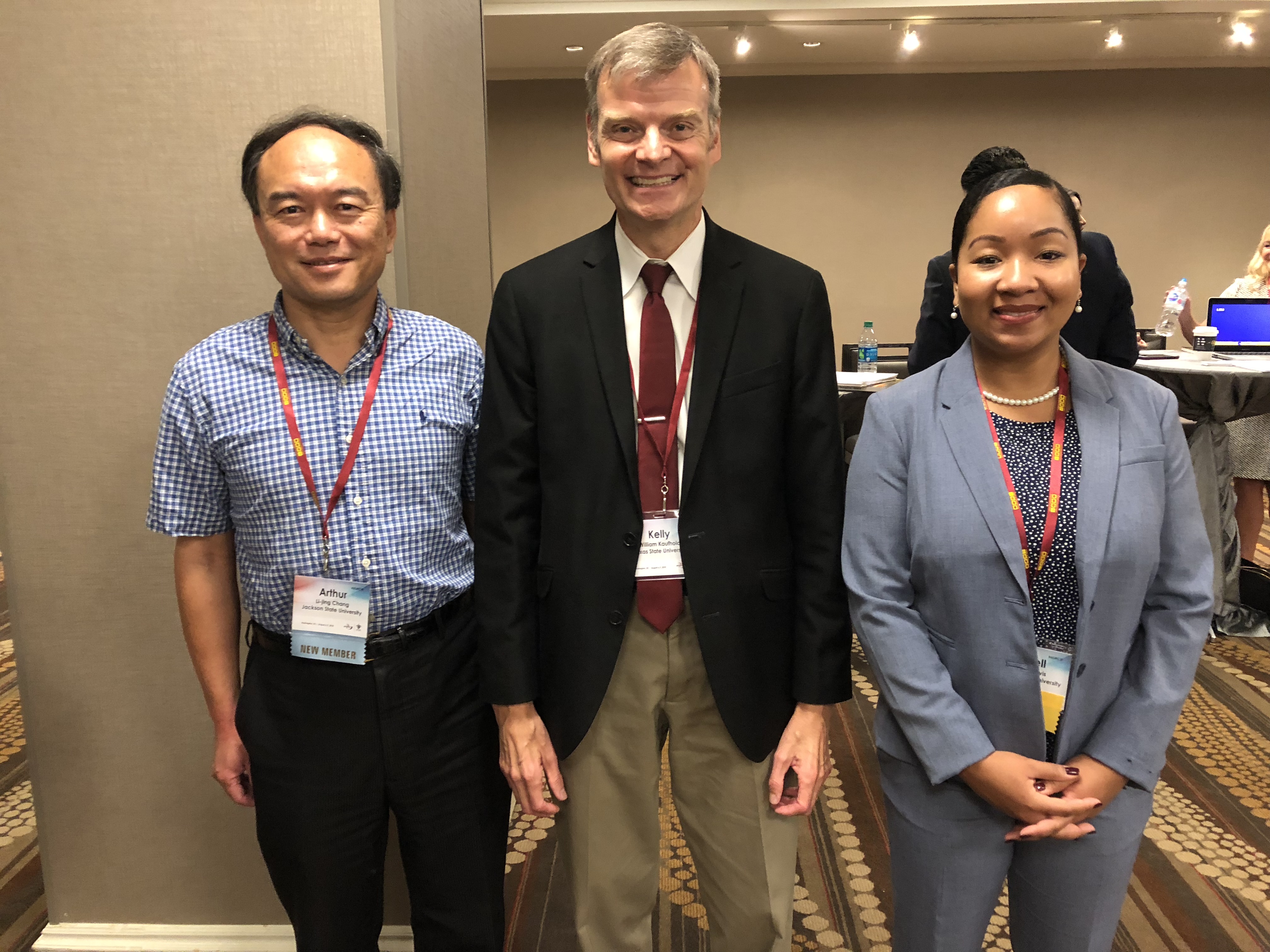 Jewell Davis, JSU alum, who was selected to present her graduate research at the Association for Education in Journalism and Mass Communications Conference is pictured with Dr. Li-jing Arthur Chang(l), assistant professor at JSU; and Dr. Kelly Kaufhold of Texas State University who served as session moderator. (Photo special to JSU)