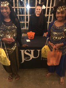 Heather Wilcox, center, assistant director of CUBD, was part of the JSU crew distributing candy and supporting the zoo’s fundraiser during Boo at the Zoo. Positioned near the tiger exhibit, she’s joined by a two participants dressed as gypsies.