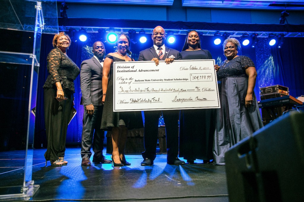 JSU’s Division of Institutional Advancement presented President William B. Bynum Jr. with a check that far exceeded expectations. The scholarship funds will help defray expenses for students. Bynum is pictured with inauguration committee members: Constance Lawson, co-chair, left; David Howard, co-chair; Veronica Cohen, chair; and Maxine Greenleaf, co-chair. (Photo by Charles A. Smith/JSU)