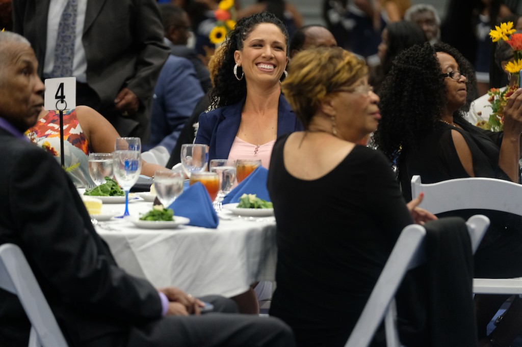 LPGA player Shasta Averyhardt is amused by the antics of emcee Rob Jay as he engaged each of the inductees in light banter. (Photo by Charles A. Smith)