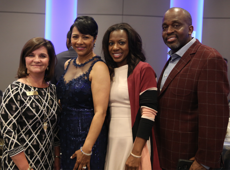 First Lady Deborah Bynum poses with luncheon guests. (Photo by Charles A. Smith)
