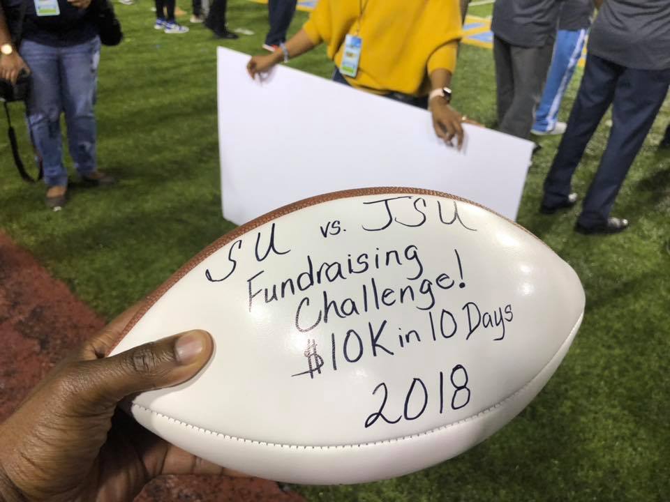 JSU versus SU game day ball presented during half-time acknowledging JSU as the fanraising champion!
