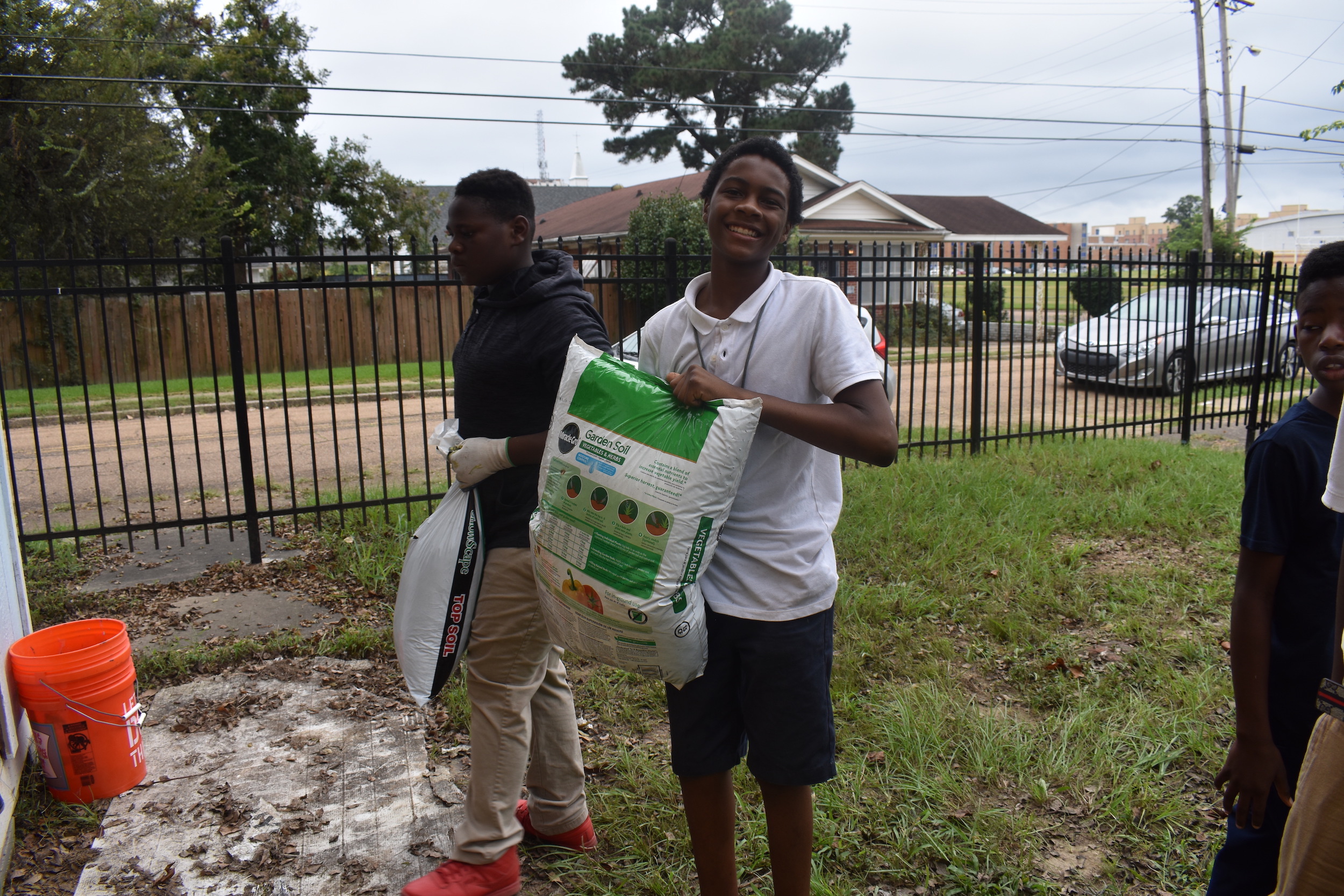 Students at Blackburn Middle Laboratory School get ready to prepare garden soil for planting. Jackson State University’s Center for University-Based Development helped spearhead the project with the Jackson Public School.