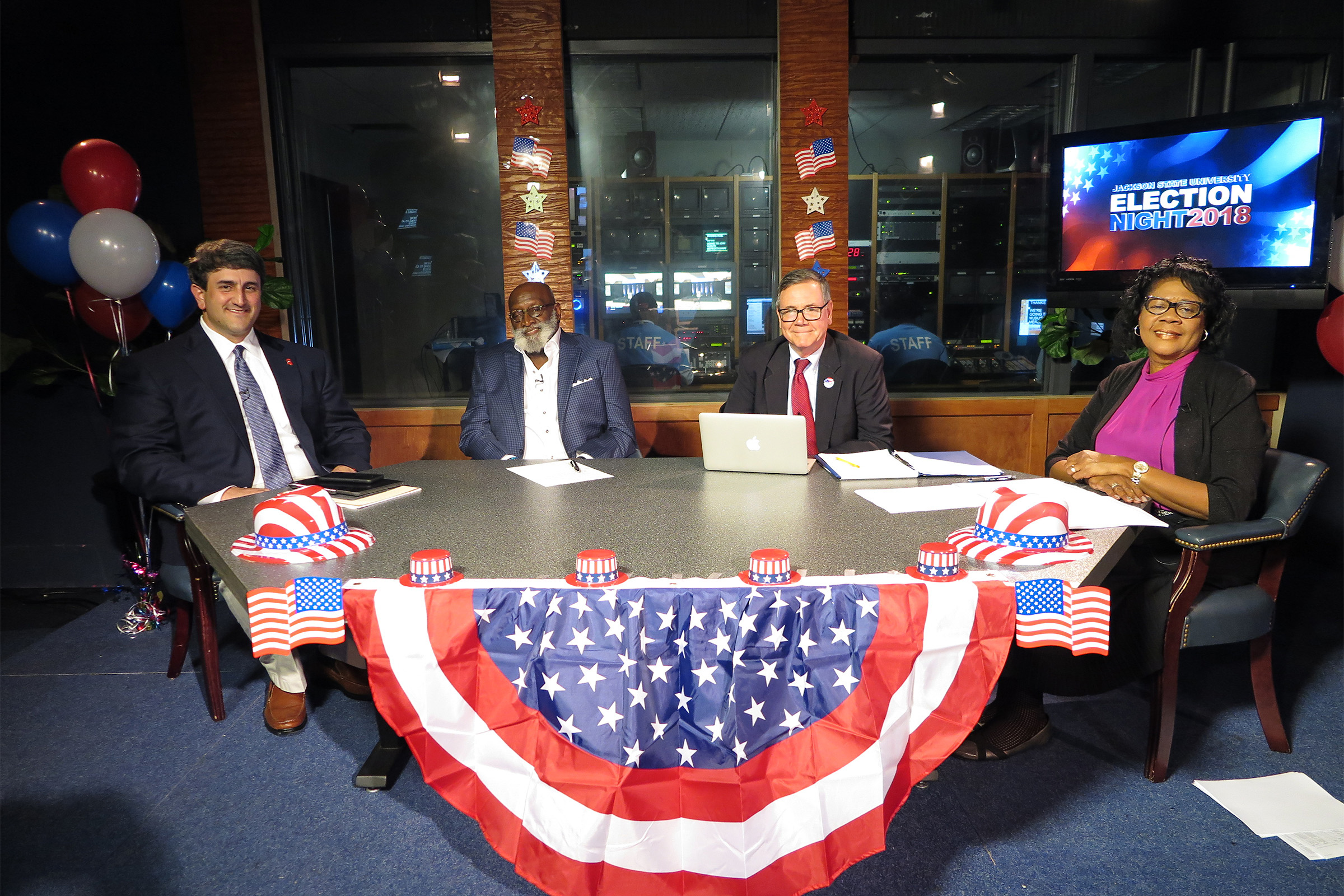 Joe Nosef, former Mississippi Republican party chairman, (far left); Dr. Ricky Hill, retired chair and professor of political science at JSU, (left); and David Hampton, journalist and adjunct professor of journalism at JSU (right); and Dr. Elayne Hayes Anthony, chair of the Department of Journalism and Media Studies discuss candidates, issues facing the country and election outcomes on Tuesday night. (Photo by Rachel James-Terry/JSU)