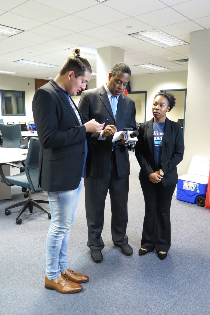 Robert 'Rob Jay' Jeuitt, executive producer of sports media for JSUtv, was an on hand interviewer for the evening. Here he pauses for a moment to talk with student reporters Luis Montgomery and Jasmine Wroten. (Photo by Rachel James-Terry/JSU)