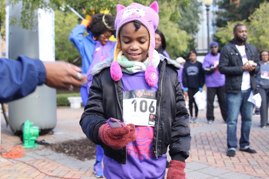 A young participant earns recognition for her time. (Photo by Aron Smith/JSU)