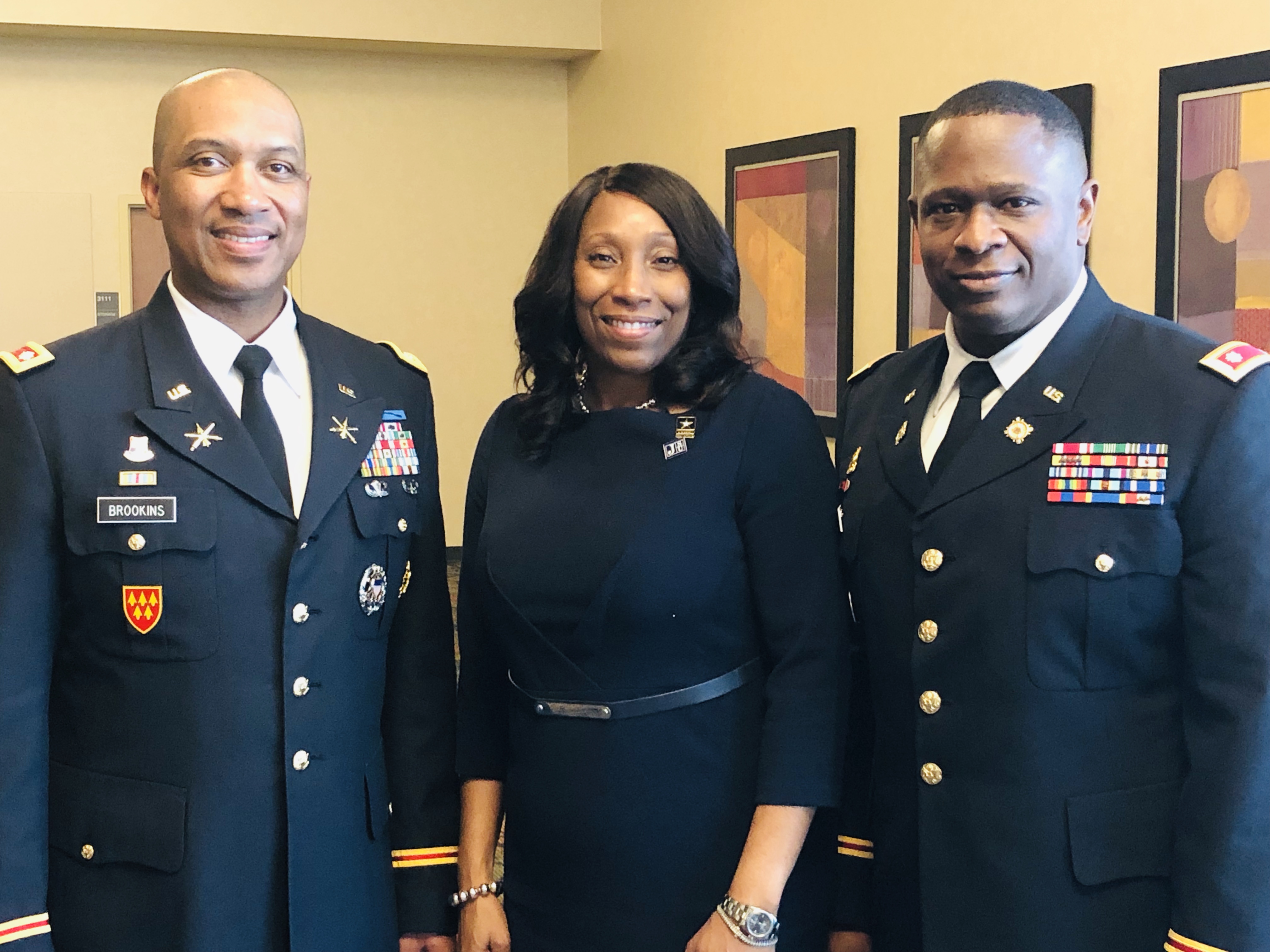 Lt. Col. Dexter M. Brookins, chair and professor of the Department of Military Science, welcomes keynote speaker Lt. Col. G. Torrie Jackson Jr., who’s accompanied by his wife Debra Mays-Jackson, vice president and chief of staff for JSU. The military officer delivered the Veterans Day address Friday. (Photo by L.A. Warren/JSU)