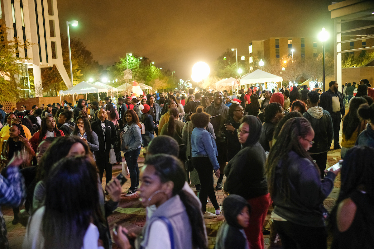 Hundred milled around absorbing the spirit of the holiday as lights illuminated the campus. (Photo by Charles A. Smith/JSU)