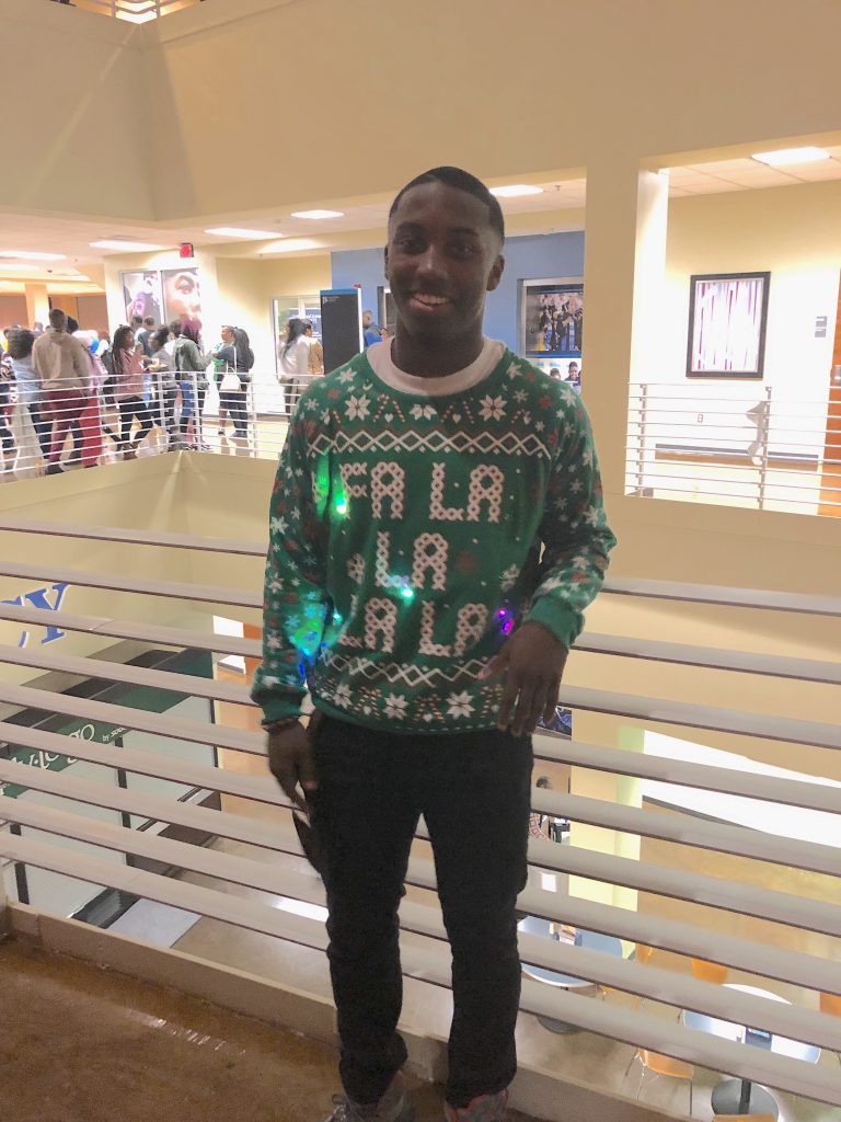 With his sweater, SGA vice president Jordan Jefferson helps brighten the holidays. (Photo by L.A. Warren)