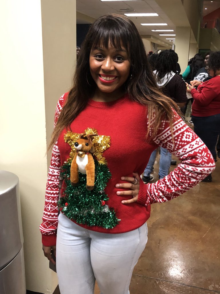 Bethany Boston, a freshman biology/pre-veterinarian major from Denver, said she was proud of her “ugly” sweater. She said she was happy to attend the event with friends, especially since she’s far away from home.” (Photo by L.A. Warren)