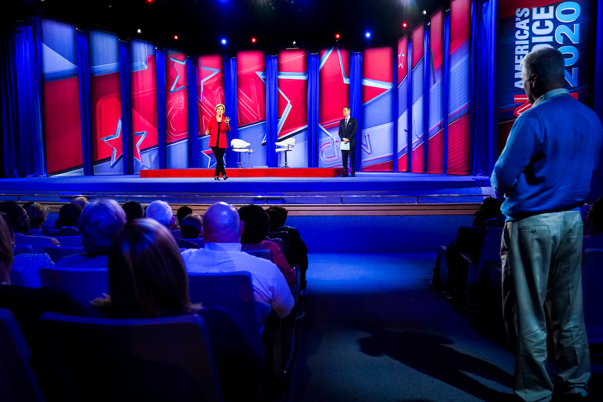 An audience member interacts with Warren during the forum. (Photo courtesy of CNN)