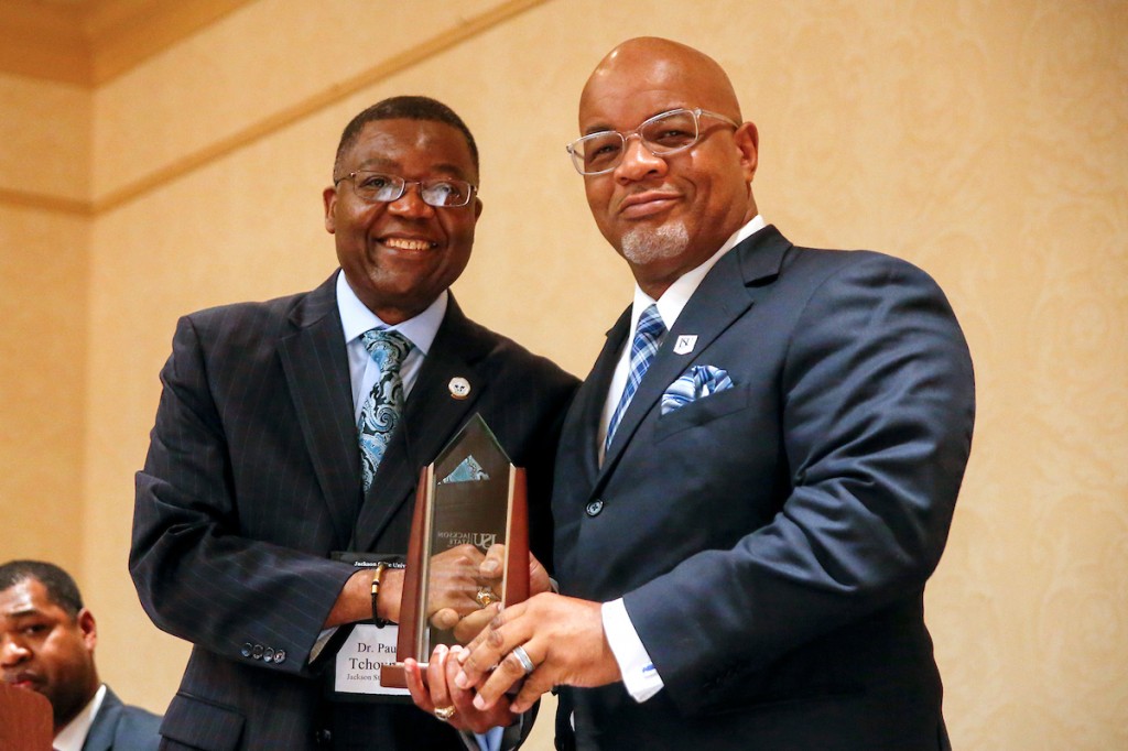 Symposium chair and JSU professor Dr. Paul Tchounwou honors JSU President William B. Bynum Jr. for supporting research. (Photo by Charles A. Smith/JSU)