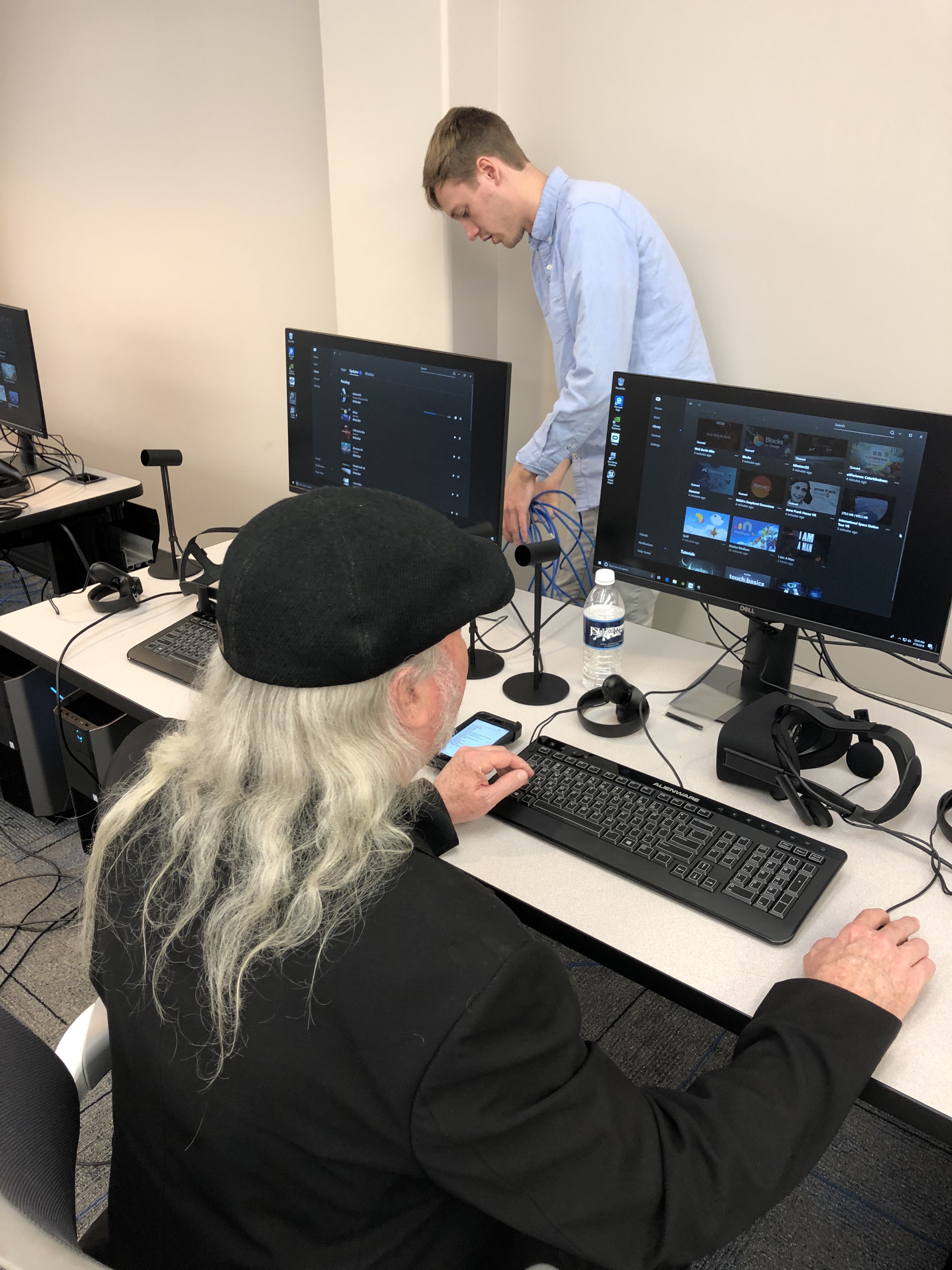 Jordan and Lobaki’s Garrison Gager, a VR curator, work to set up all the creator stations with top-of-the-line Dell Alienware desktops. The systems have been installed with the “unreal” engine development environment and other additional tools used for creating characters and digital models. They are paired with Oculus Rift headsets. (Photo by L.A. Warren/JSU)
