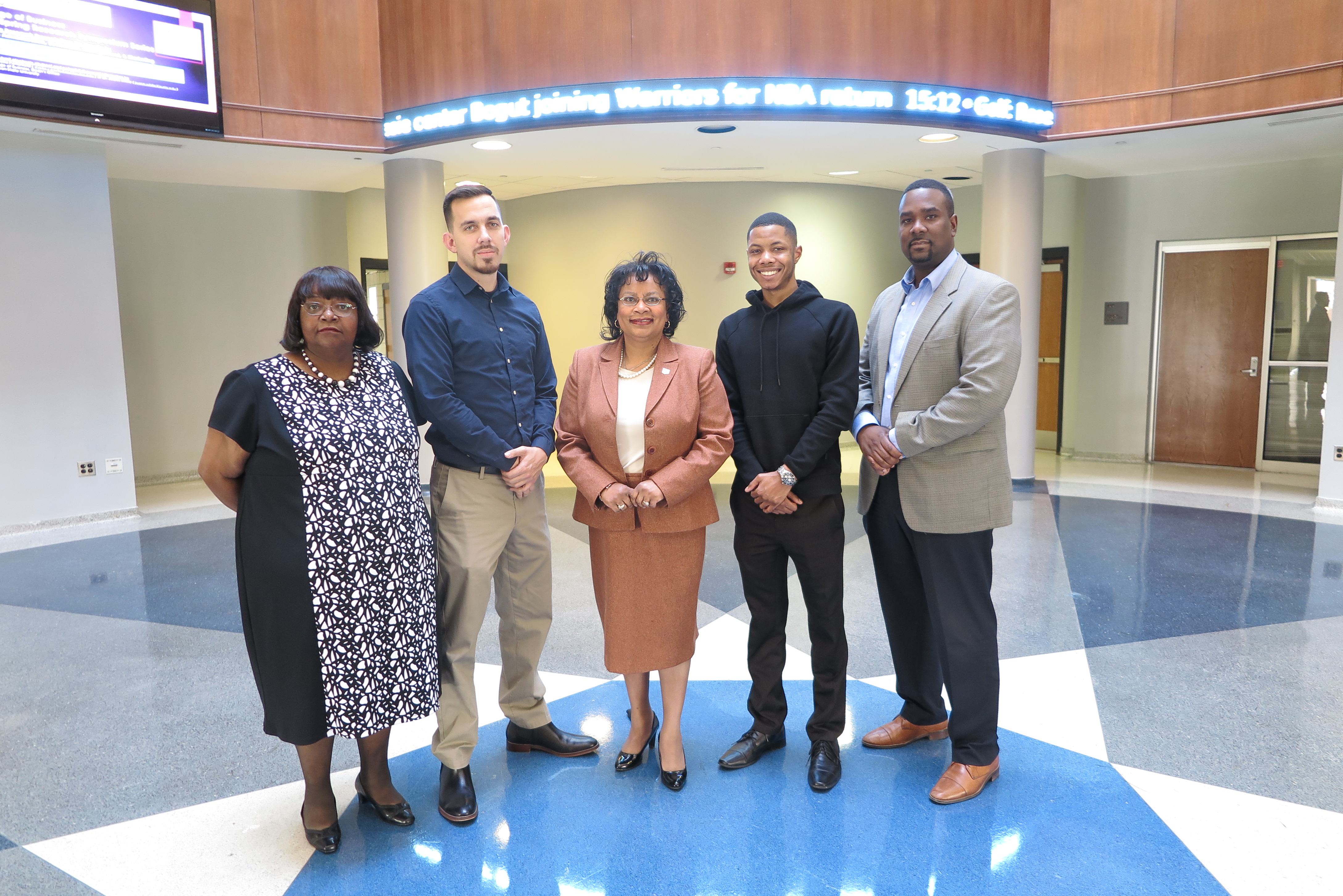 Pictured from (Left to Right): Janice May, Thay Montgomery, Dr. Sheila Porterfield, interim dean for the College of Business, Cordarius Robinson and Larry Day, visiting instructor for Finance.