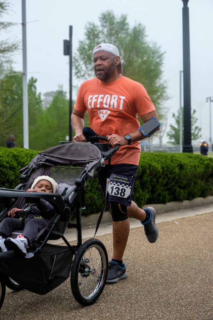 A participant turns the run/walk into a family experience. (Photo by Charles A. Smith/JSU)