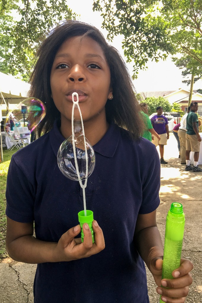 Amariye Ledbetter, a Blackburn sixth-grader, said, “It makes me feel like I did something important, and they actually appreciate the food that I help grow from the ground.” (Photo by Charles A. Smith/JSU)