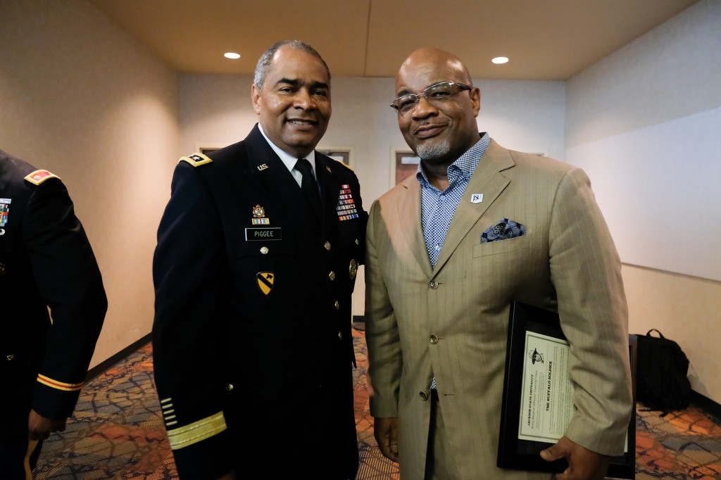 William B. Bynum, 11th president of Jackson State University, pauses from congratulating the cadets to take a picture with Lt. Gen. Aundre F. Piggee, keynote speaker, for the Tiger Battalion, class of 2019, on May 2. (Photo by Charles. A. Smith/JSU)