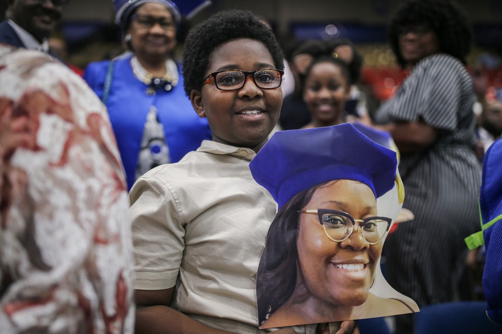 Supporters wait proudly as the graduates receive their degrees.