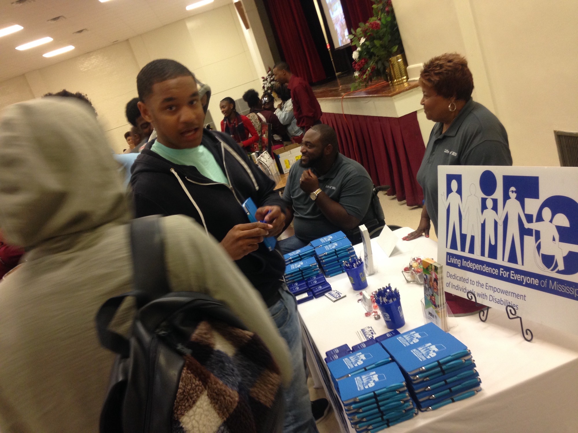 A prom participant peruses vendor stations for information that potentially could save his life and that of his peers.
