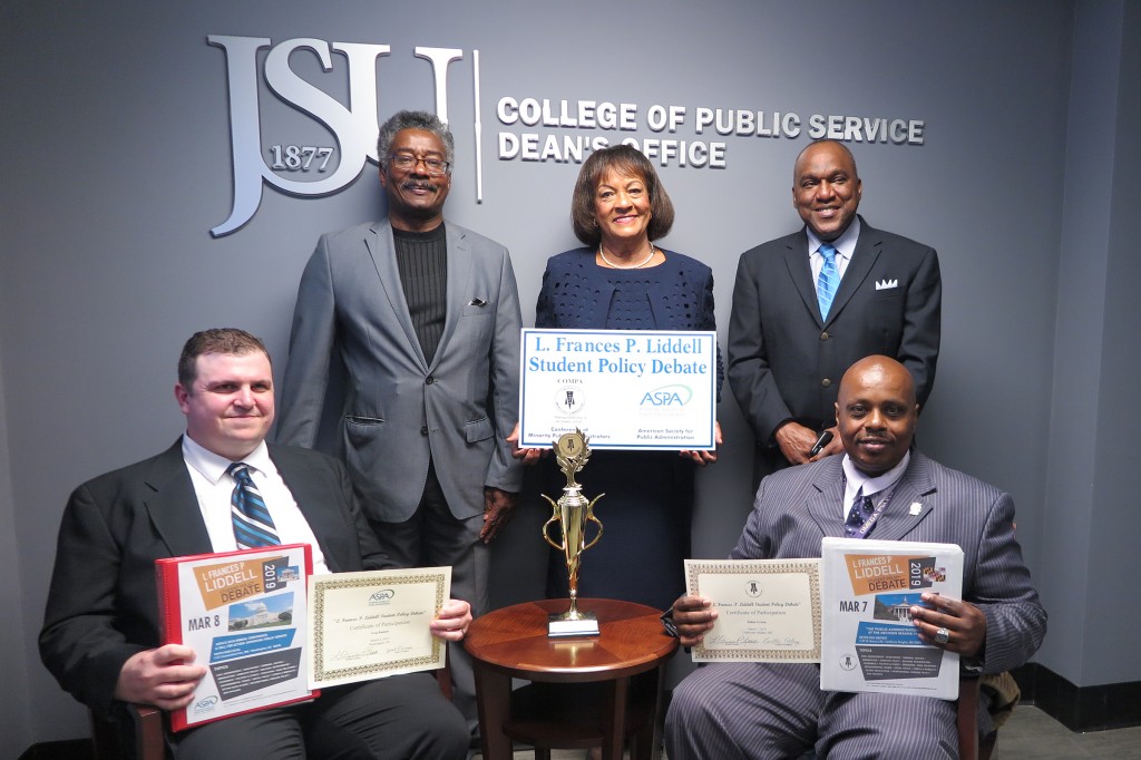 Public Policy administrators standing (left to right): Dr. Johnny B. Gilleylen, Sr., chair of the Department of Public Policy and Administration; Dr. L. Frances P. Liddell, interim chair emeritus of the Department of Public Policy; and Dr. Roosevelt Shelton, interim dean for the College of Public Service. Seated (left to right) Greg Ramsey, public policy and administration Ph.D. student and Julius E. Green, II, public policy and administration student.