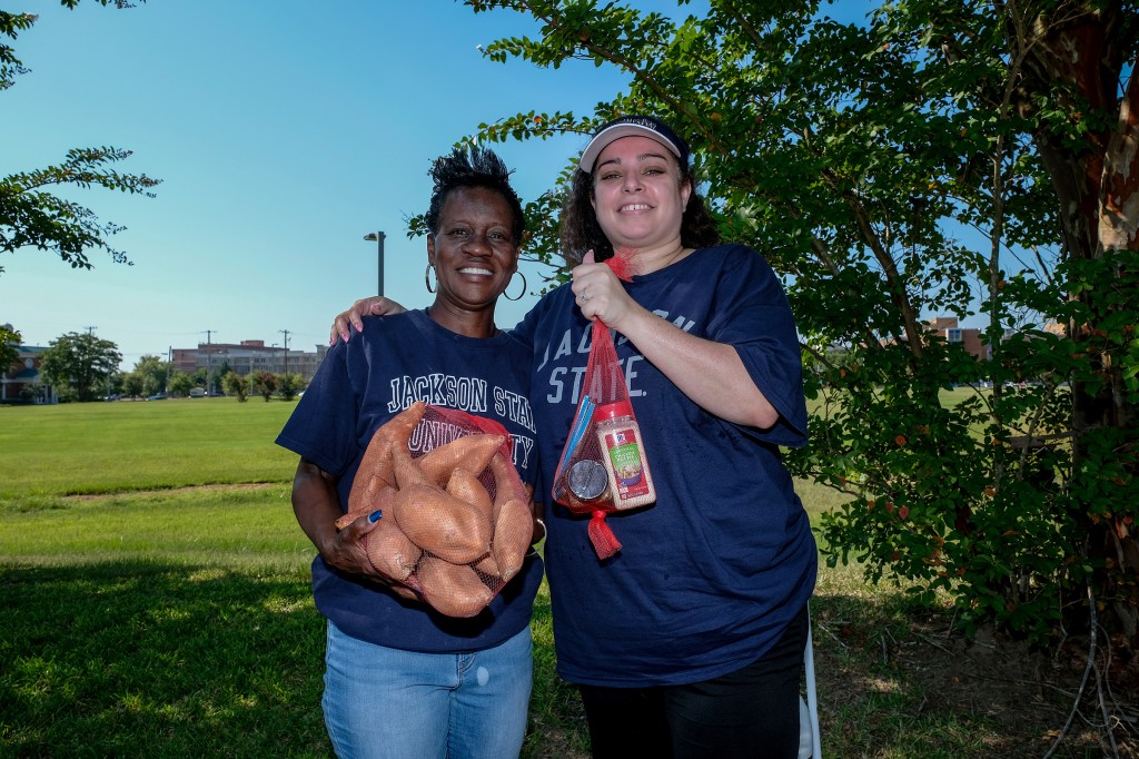 Terry Bennett (left), prevention specialist for Metro Jackson Community Prevention Coalition, and Heather Wilcox, director of community engagement at JSU, shared that they were ecstatic by the number of people and volunteers who showed up for the event. (Photo by Charles A. Smith/JSU)