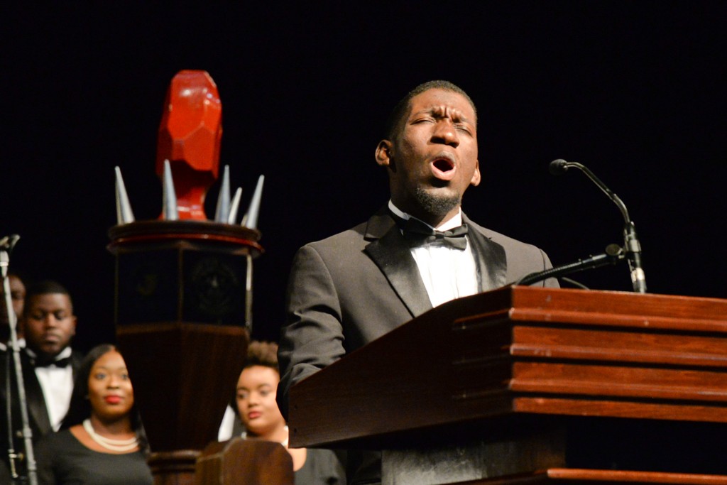 Gavin Hughes, a senior music education major, showed listeners why his concentration is in voice after a heartfelt tribute that brought the house down and the audience to their feet with wild applause. (Photo by Darek Ashely)