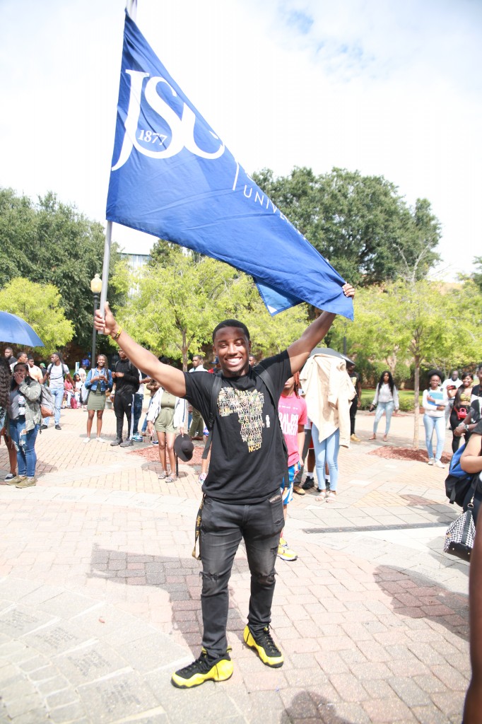 SGA President Jordan Jefferson displays a touch of blue during the outdoor worship. (Photo by Aron Smith/JSU)