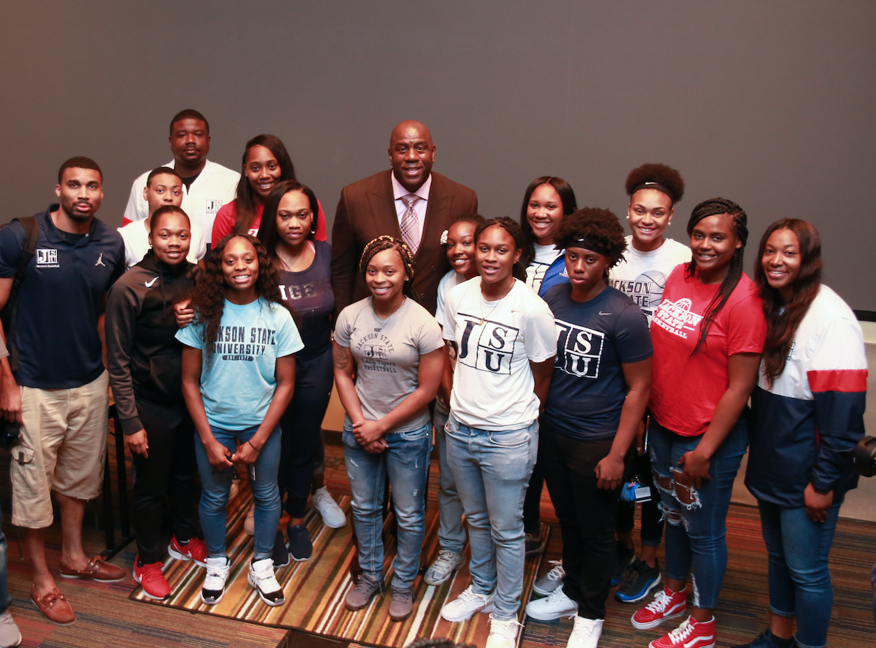 Earvin "Magic" Johnson, retired Los Angeles Laker point guard, posed for pictures with JSU students after talking about his life in the NBA and fielding questions about his drive, transition into business, rebounding after bad games, and what it felt like to play in the NBA finals, among other things. The four-time NBA champion dropped by the HBCU last Thursday, Oct. 10. (Photo by Aron Smith/JSU)
