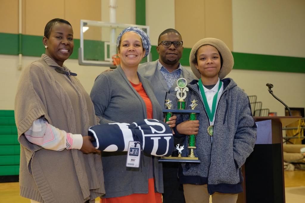 The winners were Nia and Moe Selassie of the 2019 Greens cook-off are pictured holding the 1st place trophy.