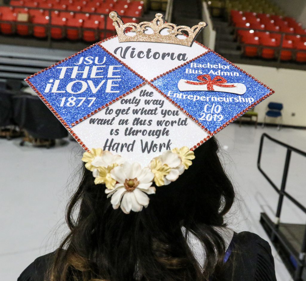 In what has now become a tradition, graduates throughout the commencement class wore their graduation caps adorned with messages displaying feelings of jubilee over their academic milestone. (Photo by Aron Smith/JSU)
