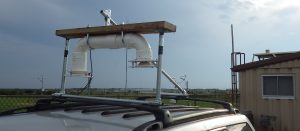 A U-shaped apparatus atop a JSU vehicle is used for measuring atmospheric pressure.