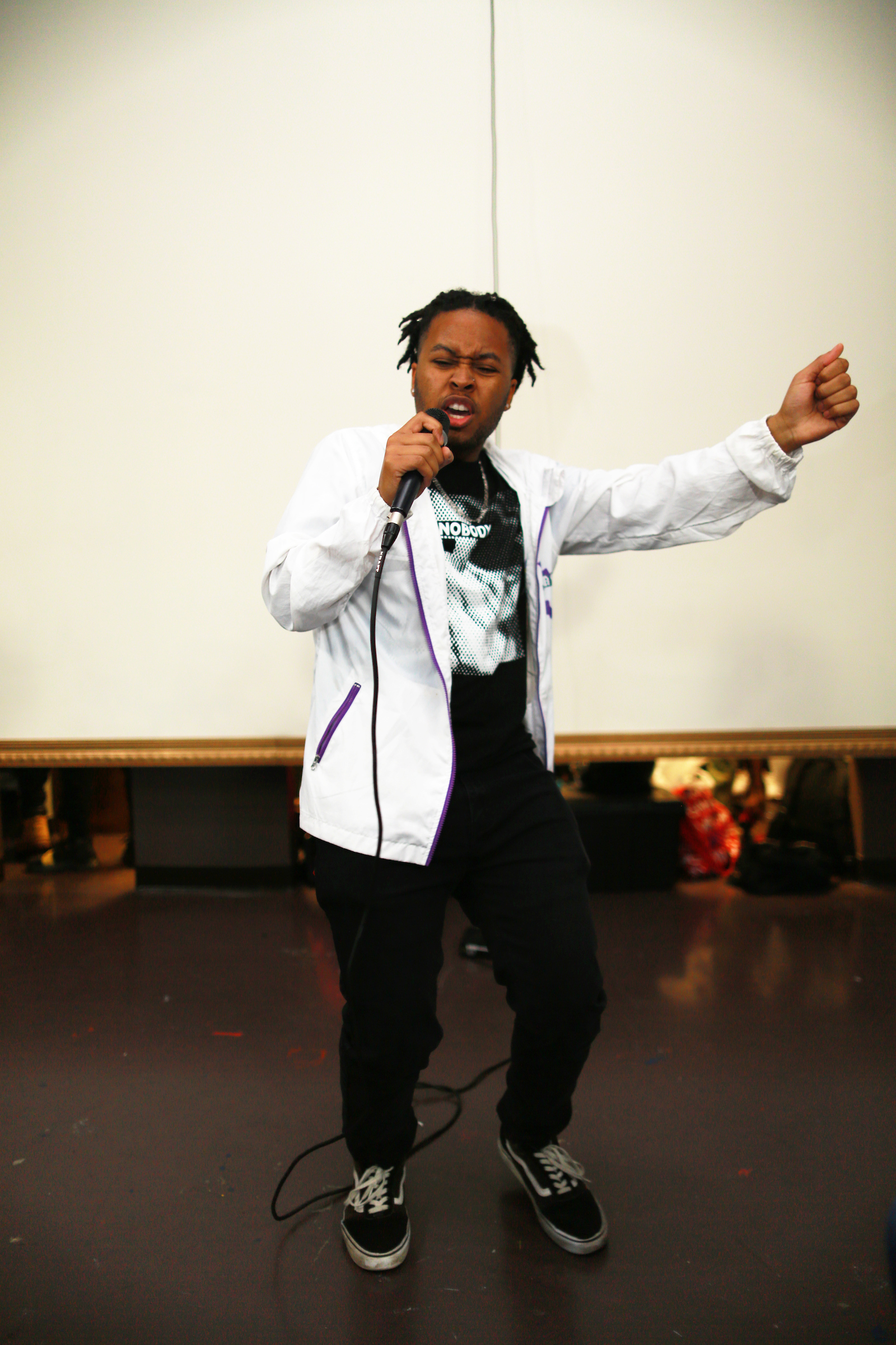 David Camper, a JSU student, who goes by the stage name Excalibur, gave attendees at the fashion show a taste of his rap performance. (Photo by William Kelly/JSU)
