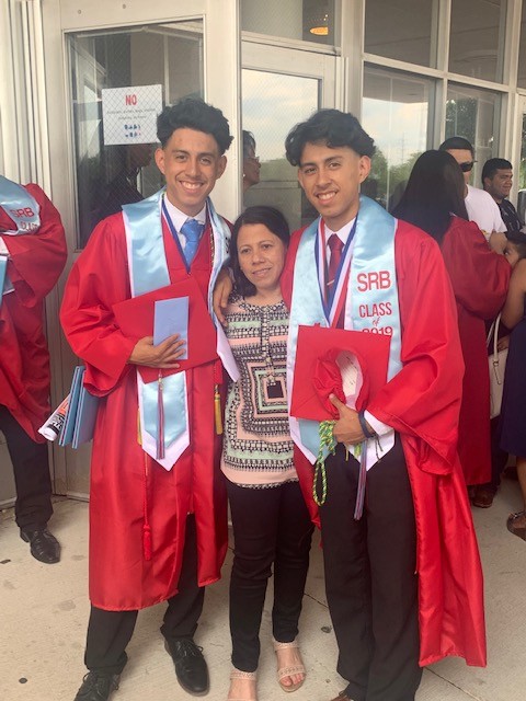 Marvin Meda, who joins the 2020-2021 J5 drum major squad at JSU, poses with his twin brother, Kevin Garcia Meda, and his mother, Bianca Qieves Meda, after the brothers' graduate from Skyline High School in Dallas. (Photo special to JSU)