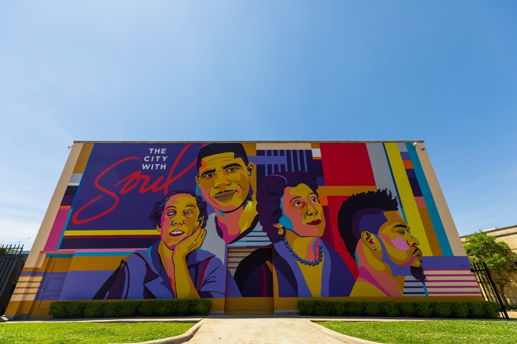 Proud is how Reshonda Perryman says she felt when she finished painting the "Jxn Icons" mural. She hints that innovation, imagination, and a passion for artistry are the keys to her success. (Photo by Tate Nations.)