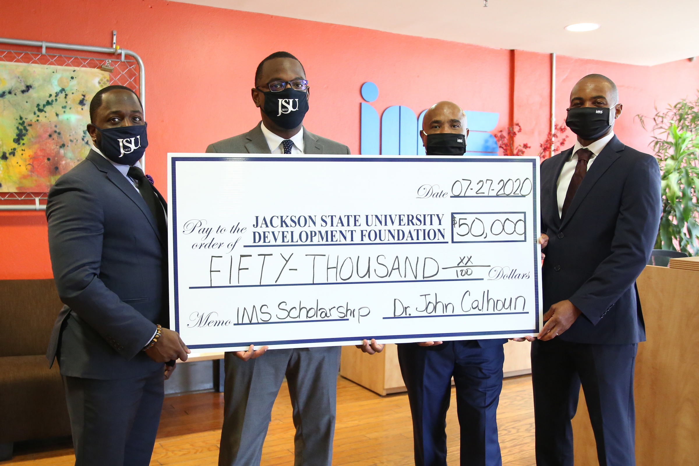 (Pictured from left to right)David Howard, research/program analyst for Division of Institutional Advancement, Thomas Hudson, Esquire, Acting President of JSU, Dr. John D. Calhoun, CEO of IMS Engineers and Rod L. Hill, COO and President of IMS Engineers.