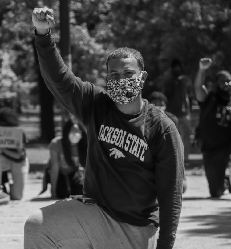 Michael Taylor, a JSU senior, pays homage to the life of George Floyd, In May, Floyd was killed when a white police officer kneeled on his neck for eight minutes and 46 seconds. (Photo by Wakil Atig)