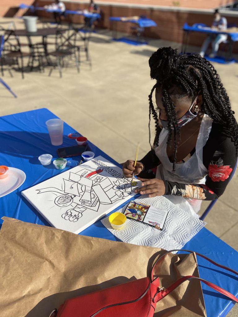 Another student illustrates through paint what the future might hold for her.