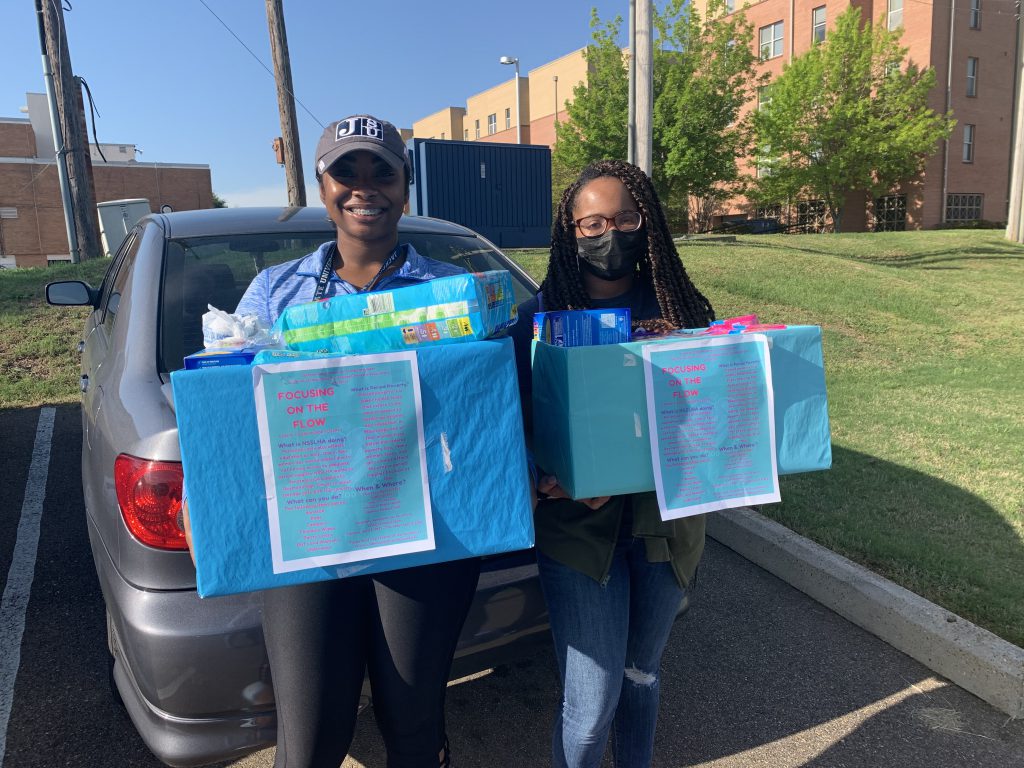 JSU NSSLHA students donating products to the students at Raymond High School in an effort to assist in ending period poverty. (Photo special to JSU)
