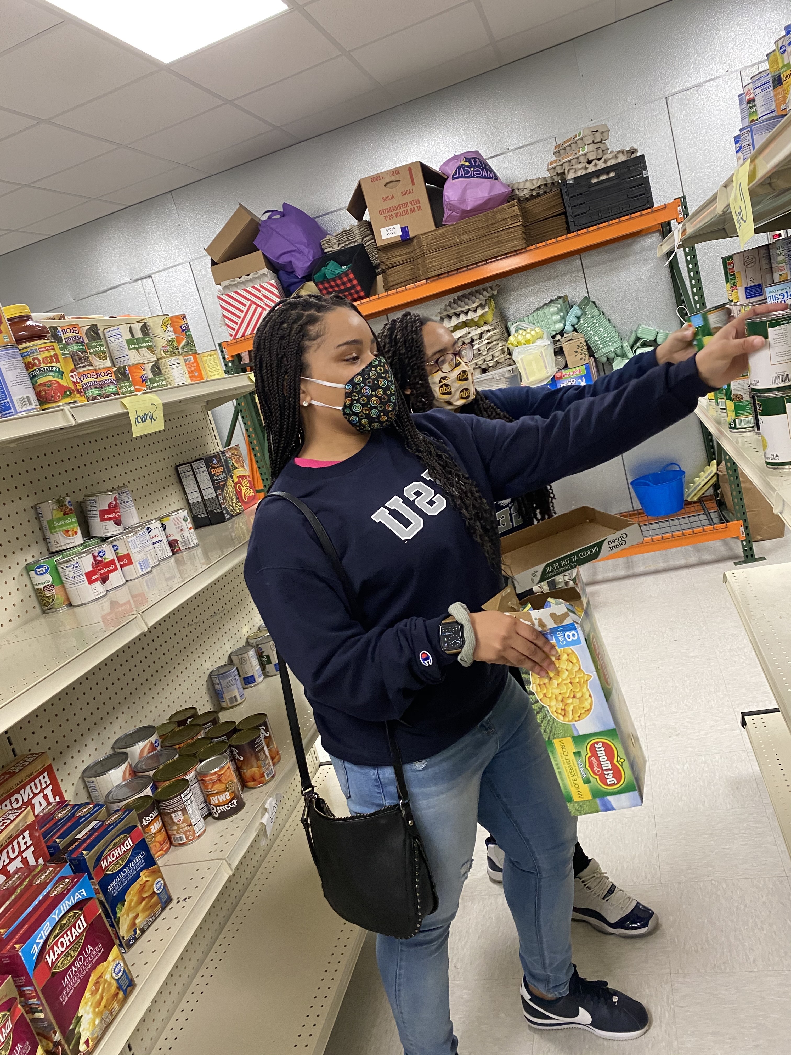 JSU NSSLHA students help to stock Stewpot Community Services and the Compass Group with canned goods, donated by the NSSLHA organization. (Photo special to JSU)
