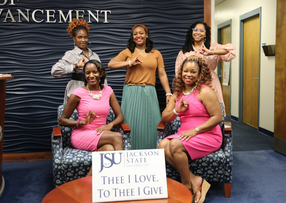 Flanked by her sisters, Wade credits her sorority for helping her to “realize the impact I can make.” (Photo by Aron Smith/JSU)