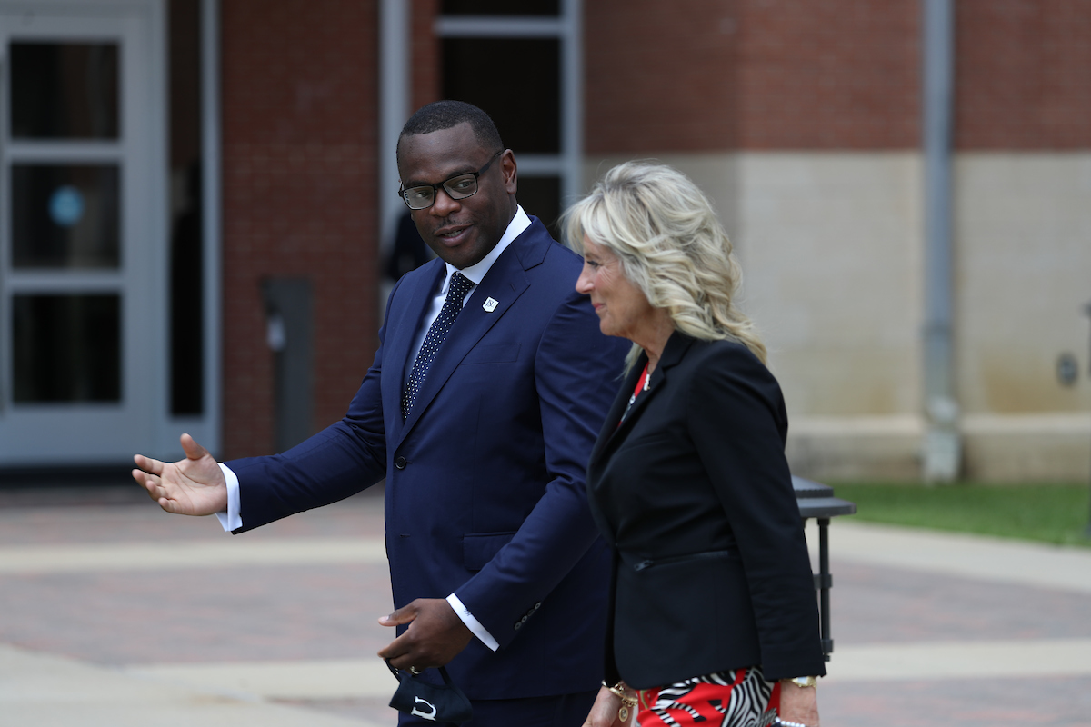 Jackson State University President Thomas K. Hudson greets and escorts first lady Dr. Jill Biden to the College of Science, Engineering and Technology building, where she would give remarks about the importance of COVID-19 vaccinations. (Photo by William H. Kelly III/JSU)