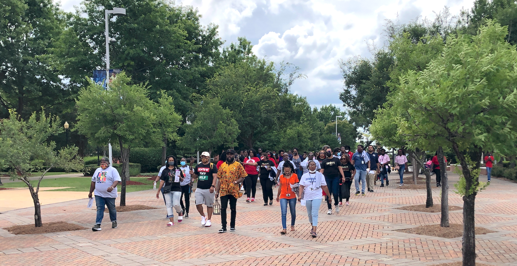 More than 100 faculty, staff and students gathered for the Juneteenth Commemoration Walk, starting on the Gibbs Green Memorial Plaza. (Photo by L.A. Warren/JSU)