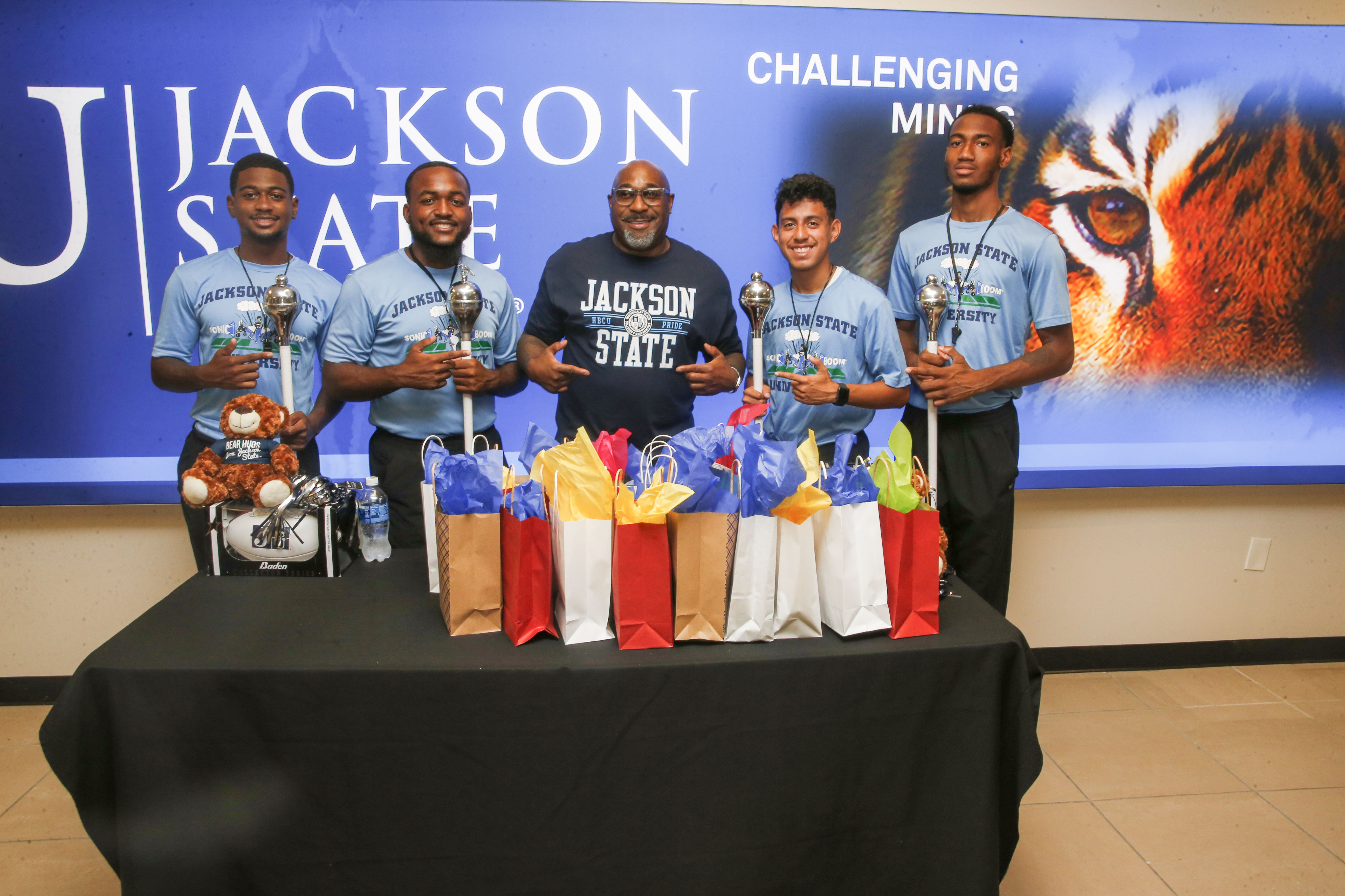 Chef G Garvin, founder of The G Garvin Culinary and Hospitality Foundation poses with the J5. Garvin gave away care packages to students that included snacks, masks and hand sanitizer. (Photos by Aaron Smith/JSU)