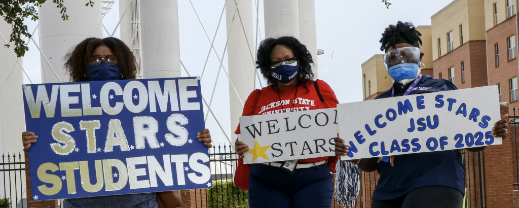 Students were welcomed by alumni with bright signs and creative chants. (Photo by Aaron Smith/JSU)