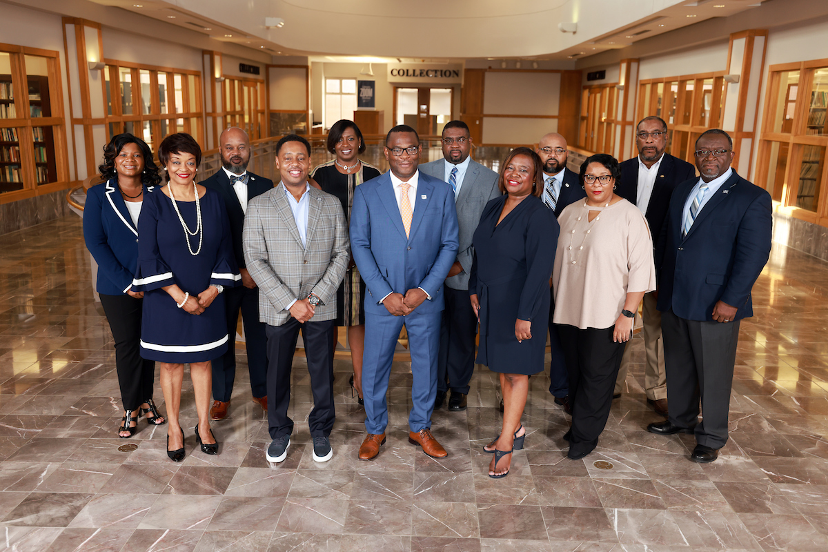 President Thomas K. Hudson (center) poses with the Jackson State University Executive Cabinet. Hudson announced that the cabinet is 100 percent vaccinated as an incentive to inspire the campus community to get the shot. (Photo by Charles Smith/University Communications)