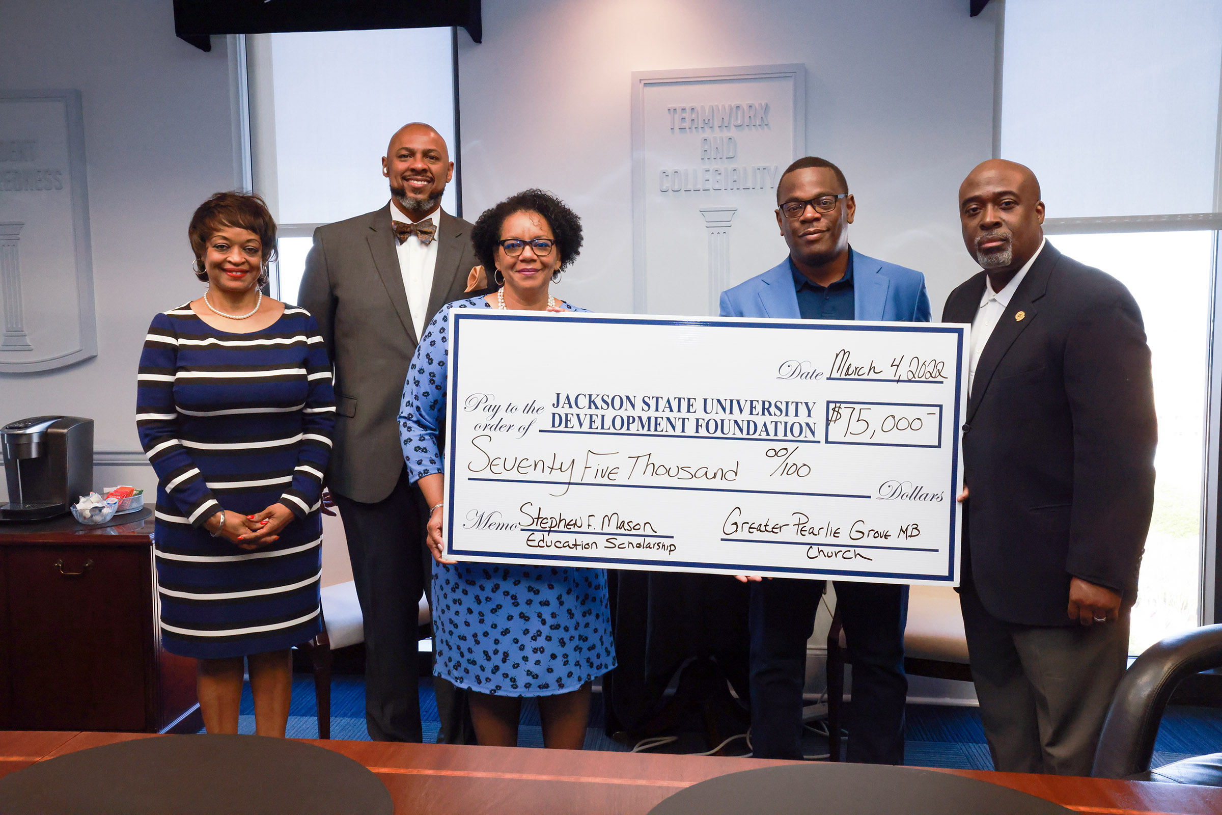 Jackson State University President Thomas K. Hudson, J.D., was presented with a $75K check for the Stephen F. Mason education endowment. Pictured from left to right: Gwen Caples, interim Vice President for Institutional Advancement and External Affairs, Rev. Arthur R. Bridges, II, Vickie T. Maston, former first lady and wife of the late Rev. Stephen F. Mason, Thomas K. Hudson, JSU president, and Robert Sutton, financial advisor for Greater Pearlie Grove Missionary Baptist Church. (Photo by Charles A. Smith/JSU)